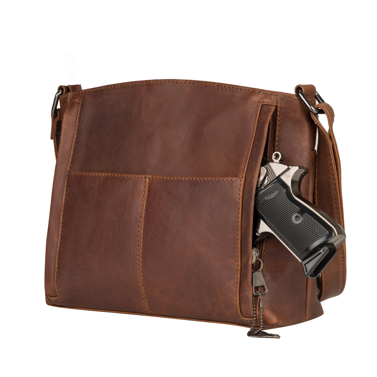 A brown leather crossbody bag with multiple zippered pockets, shown on a white background with a handgun partially inserted into one of the side pockets.