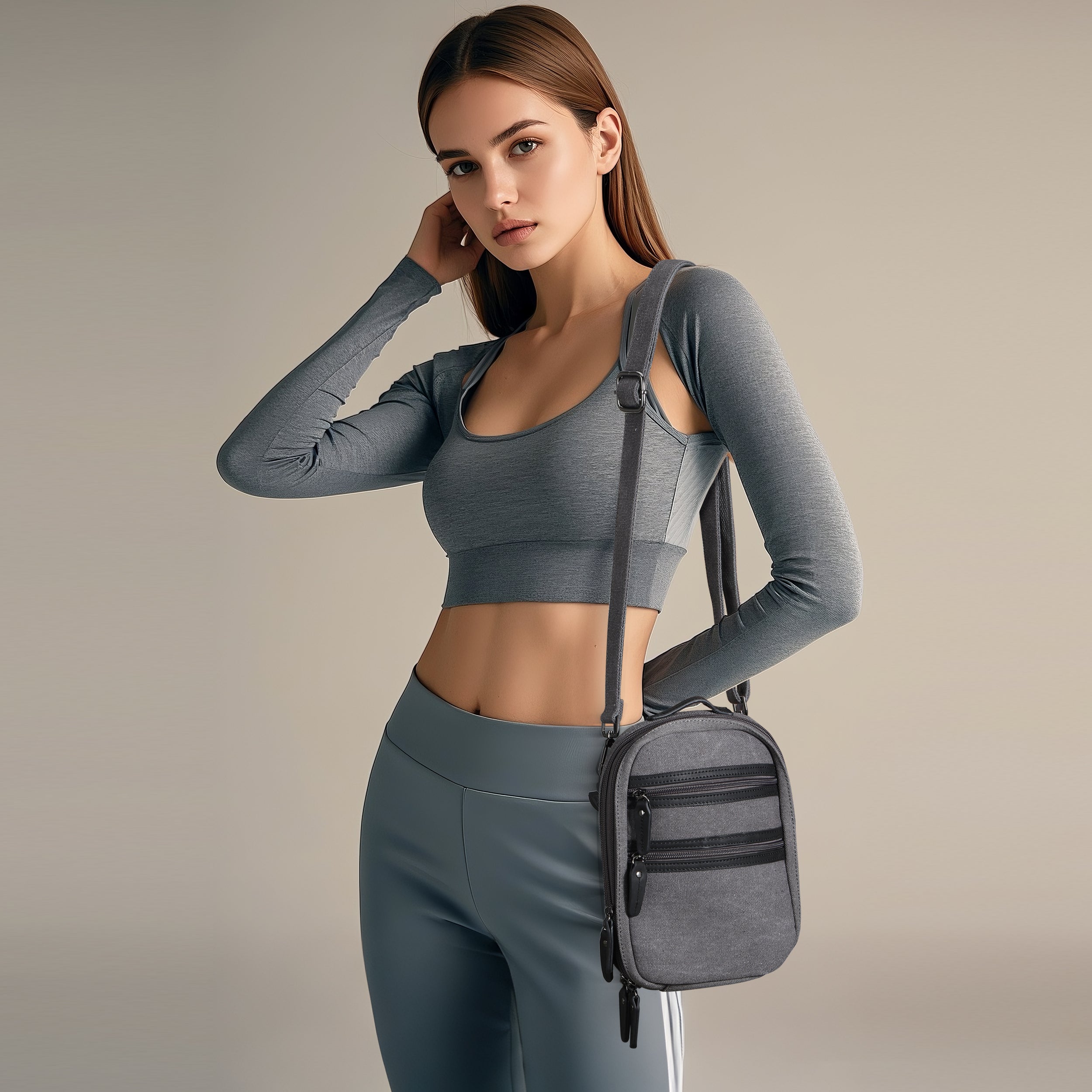 Lightweight concealed carry sling, Jax canvas crossbody with built-in mag storage and phone slot